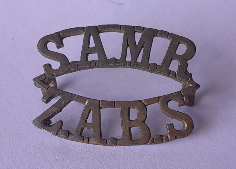 WW1 South African Mounted Rifles Shoulder Title.  Lugs Intact.