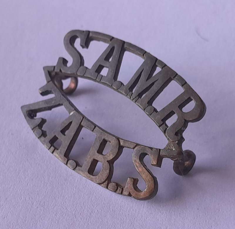 WW1 South African Mounted Rifles Shoulder Title.  Lugs Intact.