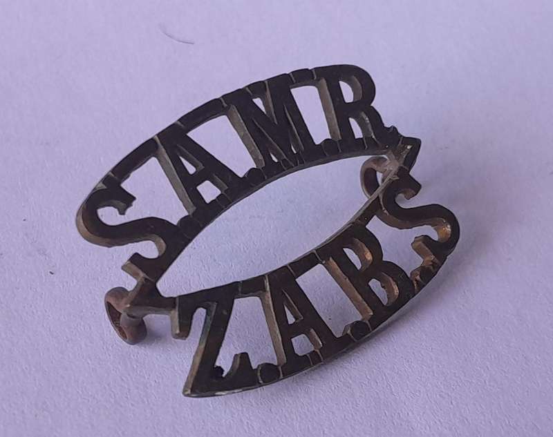 WW1 South African Mounted Rifles Shoulder Title.  Lugs Intact.