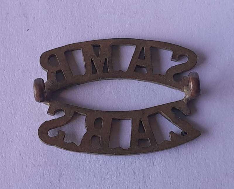 WW1 South African Mounted Rifles Shoulder Title.  Lugs Intact.