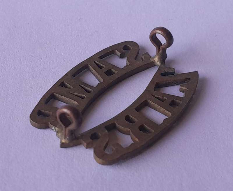 WW1 South African Mounted Rifles Shoulder Title.  Lugs Intact.