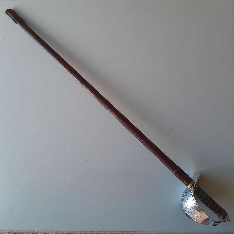 SA Army Pattern 1897 Wilkinson Sword Officer's Sword With Leather Scabbard.