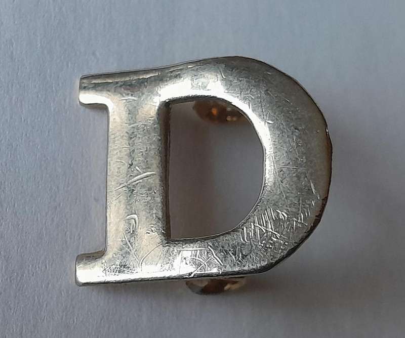 Vintage Pair "D" Company Shoulder Titles.  Lugs Intact.
