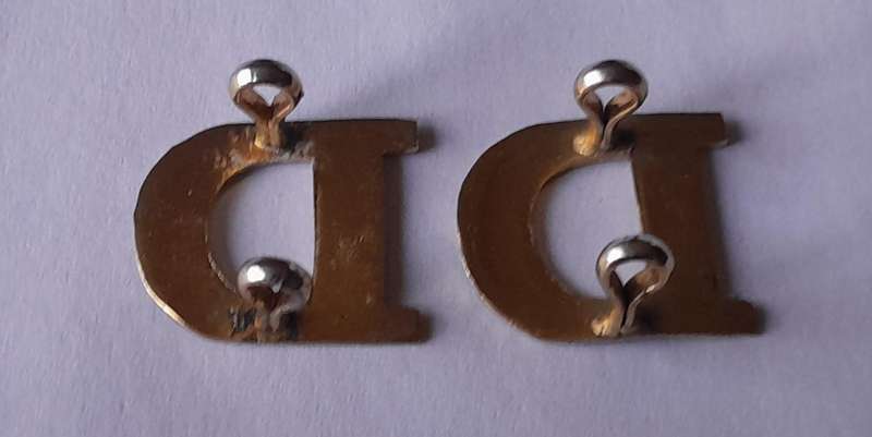 Vintage Pair "D" Company Shoulder Titles.  Lugs Intact.
