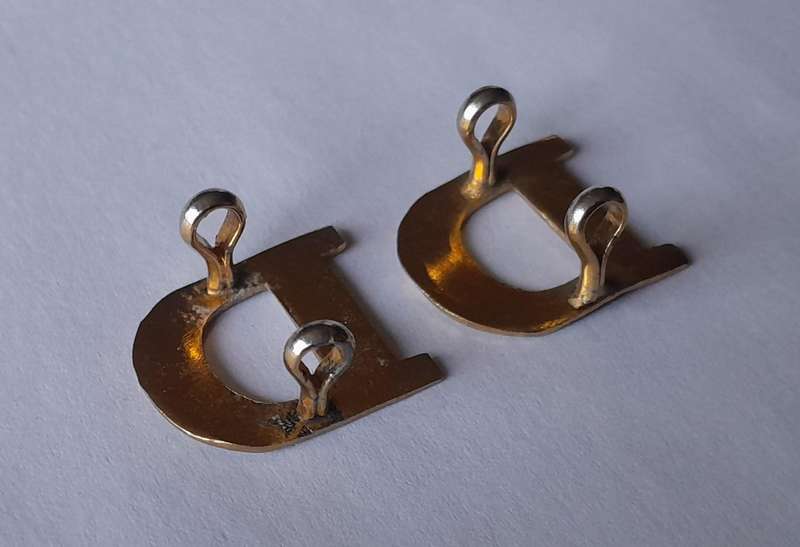 Vintage Pair "D" Company Shoulder Titles.  Lugs Intact.