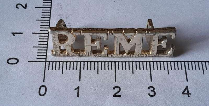British Royal Electrical Mechanical Engineers Anodised Aluminium Shoulder Title.
