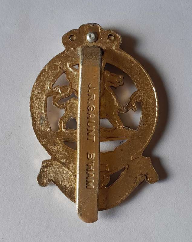 British Queens Regiment Anodised Aluminium Cap Badge.  JR Gaunt.  Slider Intact.