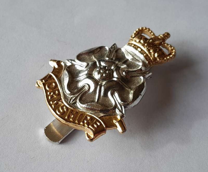 Yorkshire Brigade Anodised Aluminium Badge by Firmin.  Bent Slider Intact.