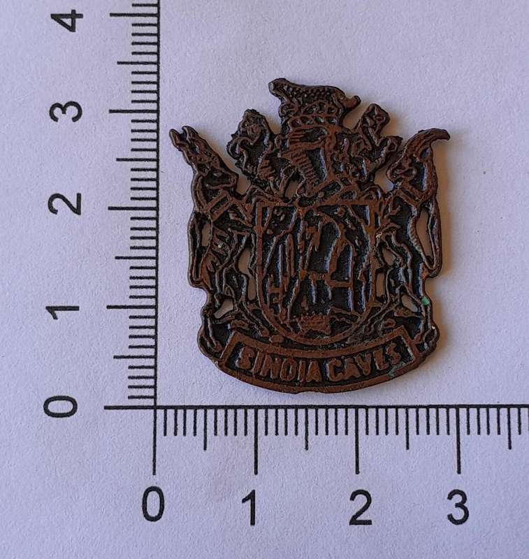 Rare Vintage Rhodesian "Sinoia Caves" Metal Badge.