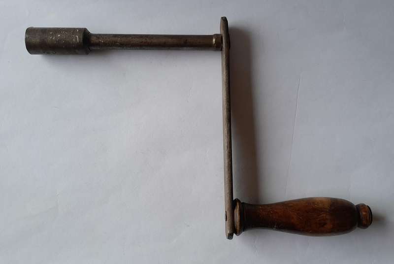 Antique Hand Crank With Turned Wood Handle.