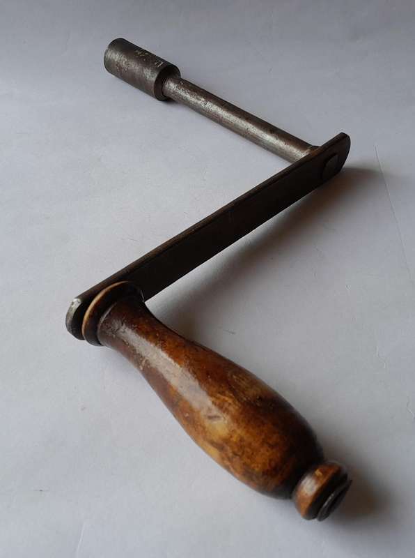 Antique Hand Crank With Turned Wood Handle.