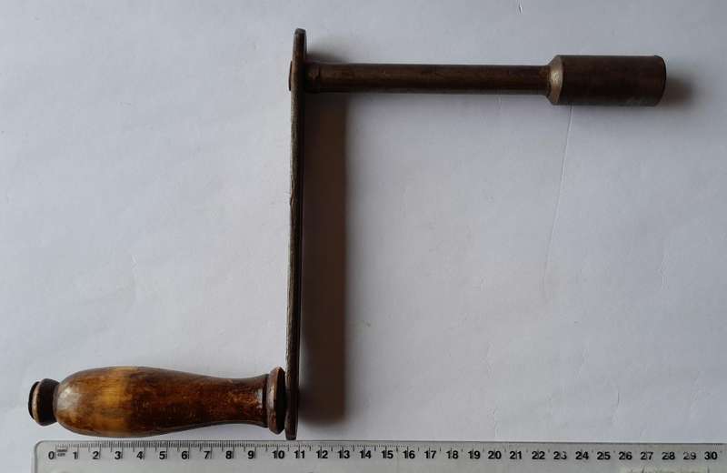 Antique Hand Crank With Turned Wood Handle.