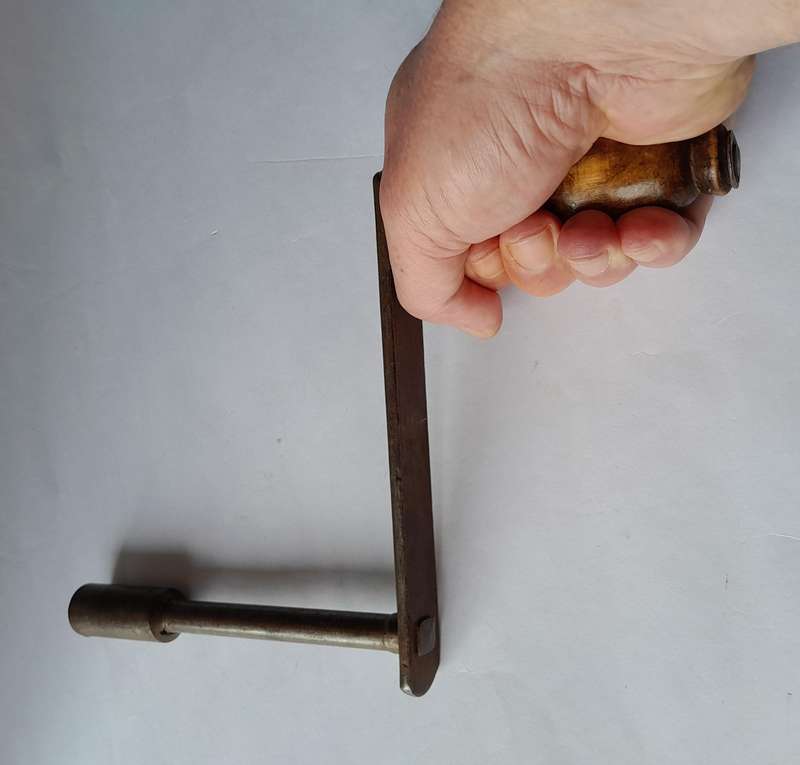 Antique Hand Crank With Turned Wood Handle.
