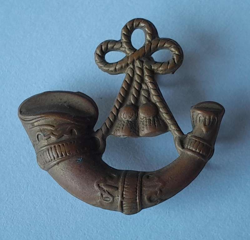WW2 British Light Infantry Badge.  Lugs Intact.