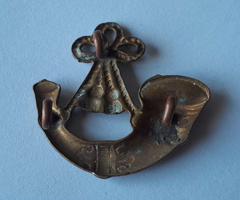 WW2 British Light Infantry Badge.  Lugs Intact.