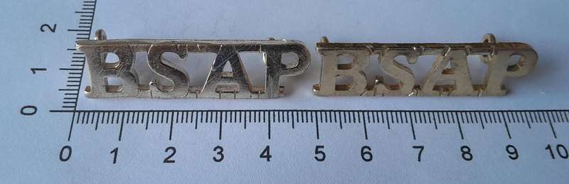 Pair Rhodesian BSAP (British South African Police) Shoulder Titles.  Lugs Intact.
