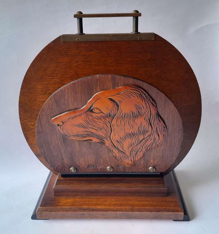 Austrian Art Deco Double-Sided Magazine Holder With Hand-Carved Dog Motifs.