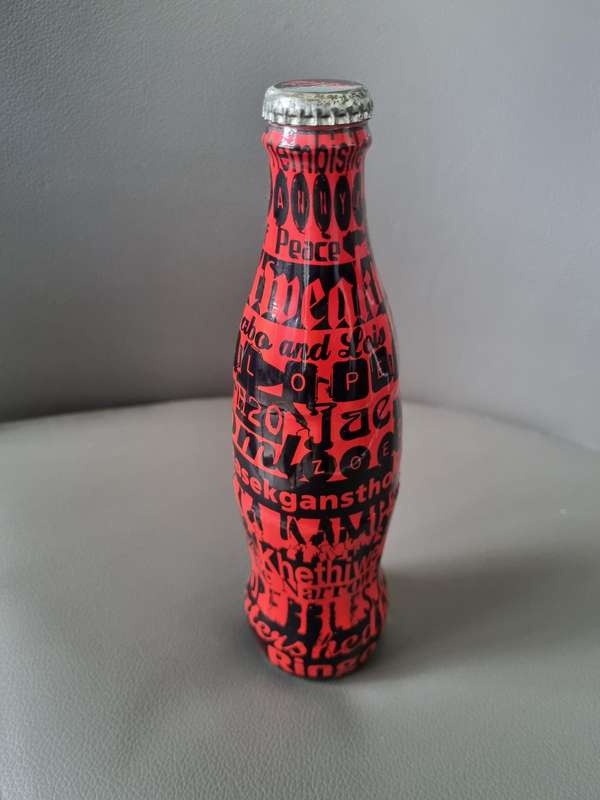 Coka Cola Wrapped Brand Bottle