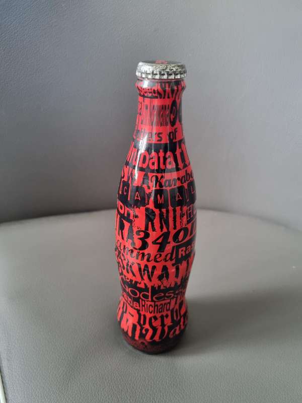 Coka Cola Wrapped Brand Bottle