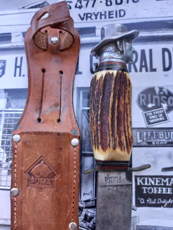 1961 Puma Hunting Knife: Solingen German Blade with custom settler head hilt top and Ivory handle