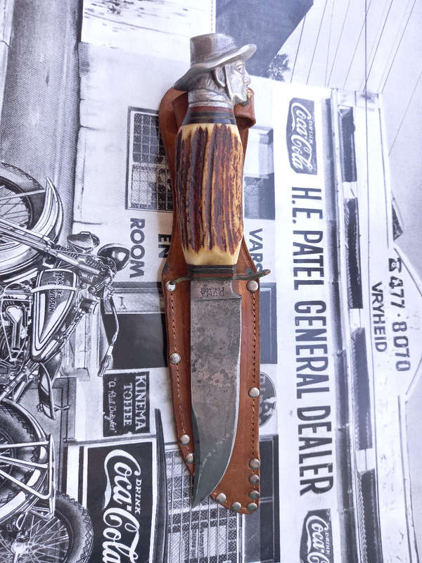 1961 Puma Hunting Knife: Solingen German Blade with custom settler head hilt top and Ivory handle