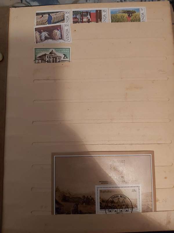 ALBUM WITH SOUTH AFRICA AND SWA STAMPS