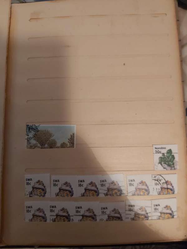 ALBUM WITH SOUTH AFRICA AND SWA STAMPS