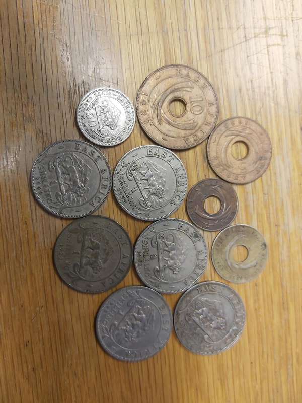 EAST AFRICA COINS (SEE DATES AS PER PHOTO. IT INCLUDES 1922 SILVER 1 SCHILLING)
