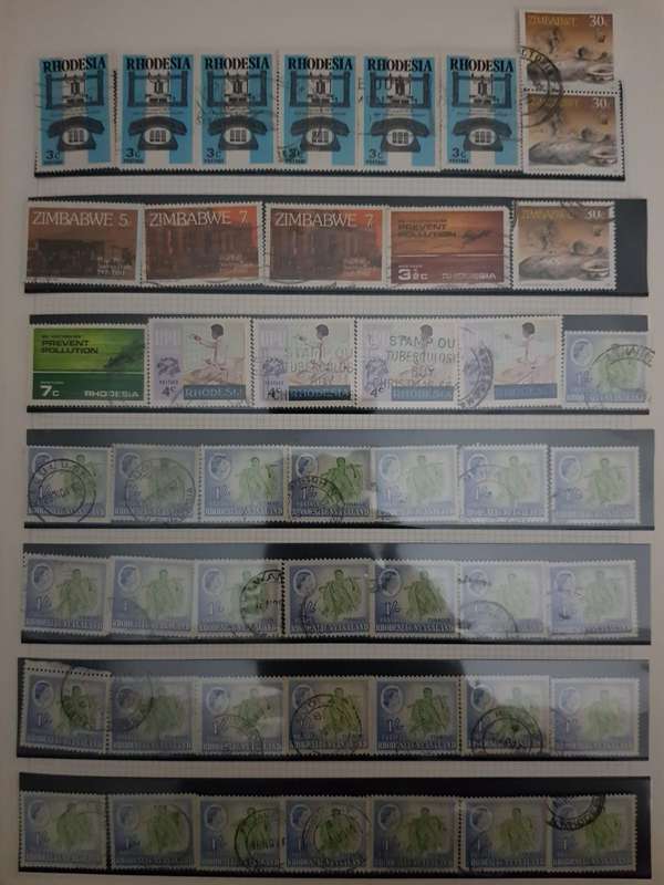 RHODESIA STAMPS USED (BID PER PAGE ,1 BID FOR ALL )