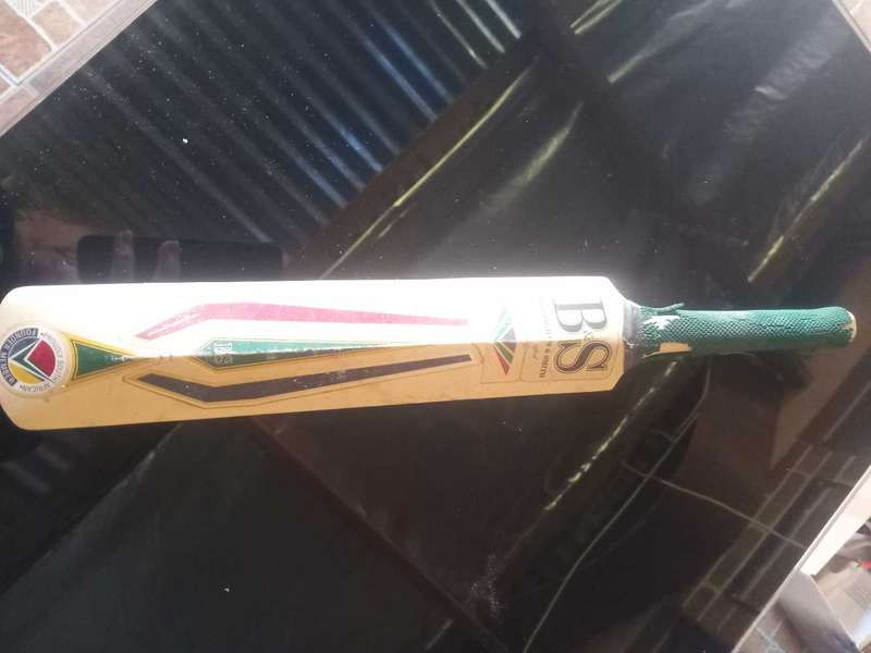 Mini Cricket bat with unknown signatures