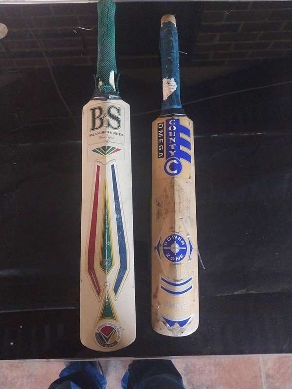 2 Mini Cricket bats one with signatures
