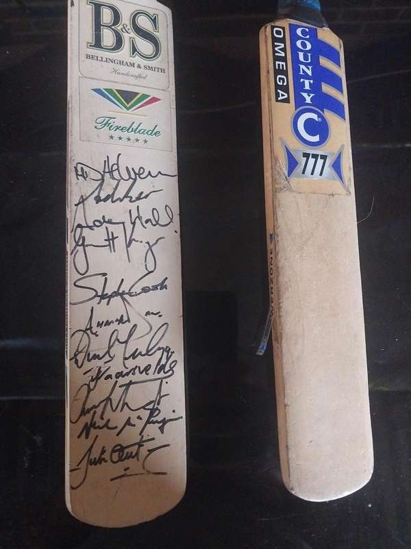 2 Mini Cricket bats one with signatures