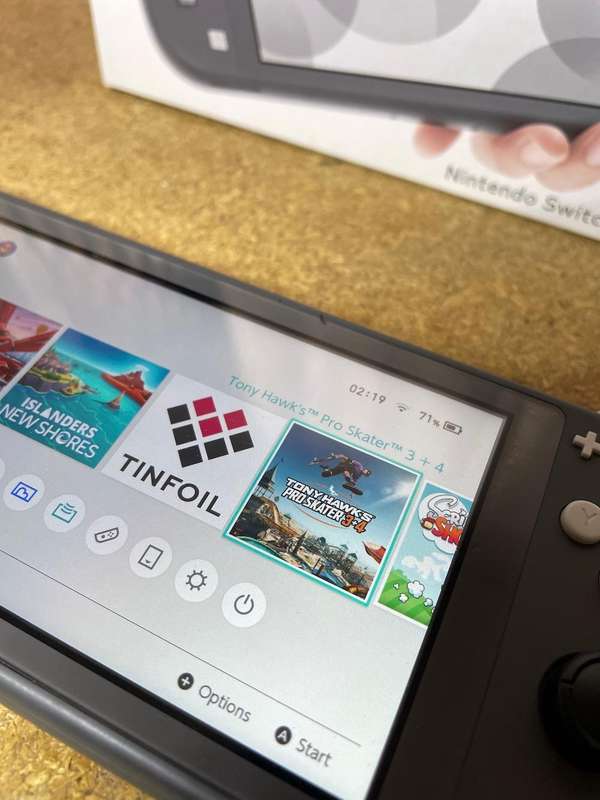 Nintendo Switch Lite with Pico Fly installed 128GB SD Card