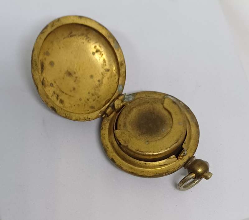 Old Brass coin holder