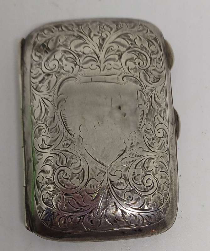 Silver case marked 36g