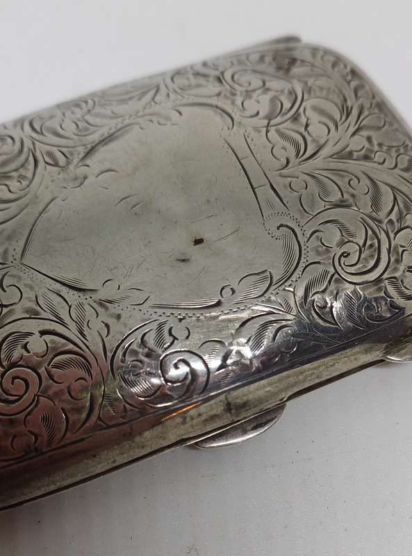 Silver case marked 36g