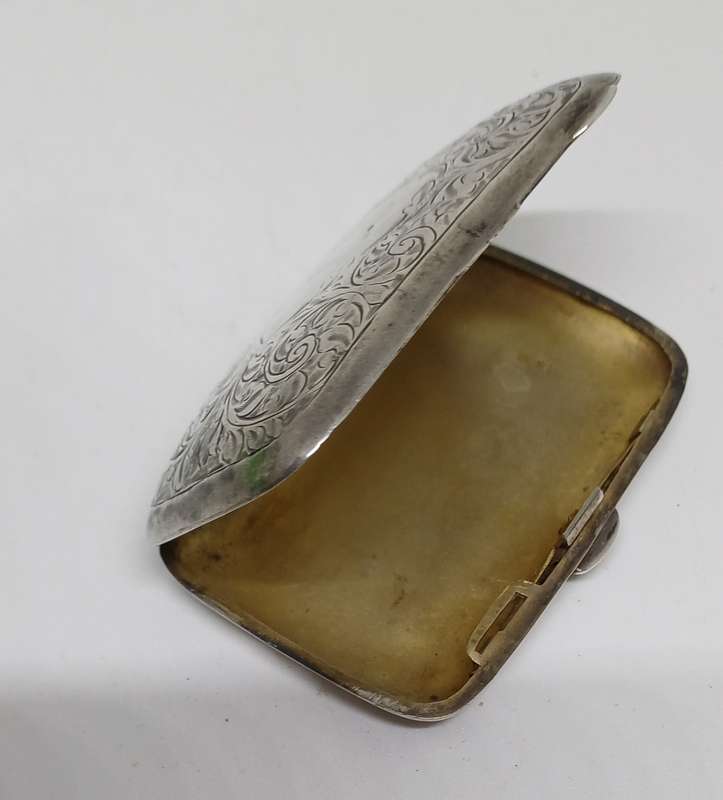 Silver case marked 36g