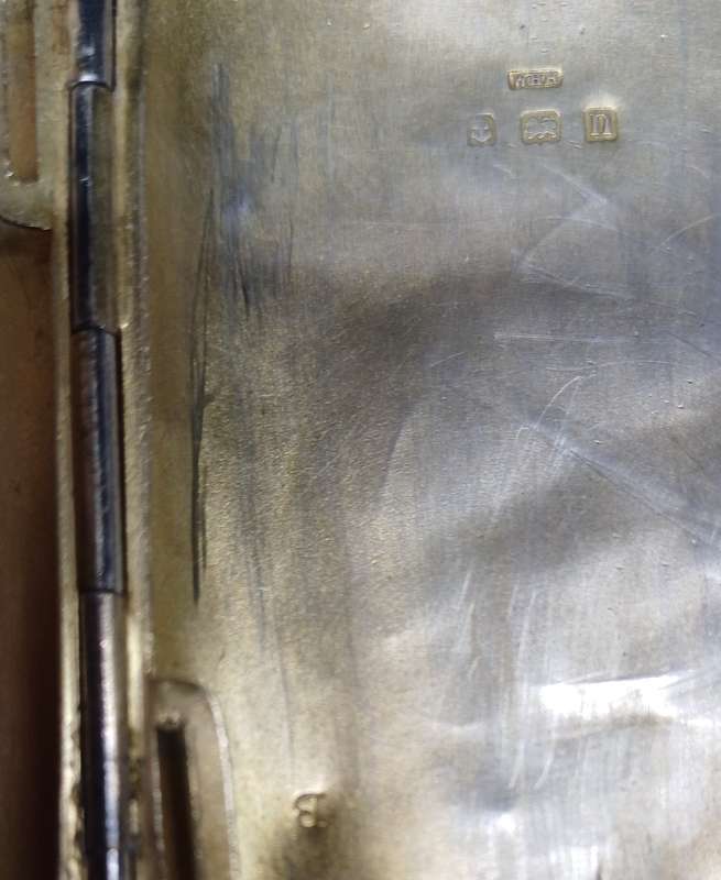 Silver case marked 36g