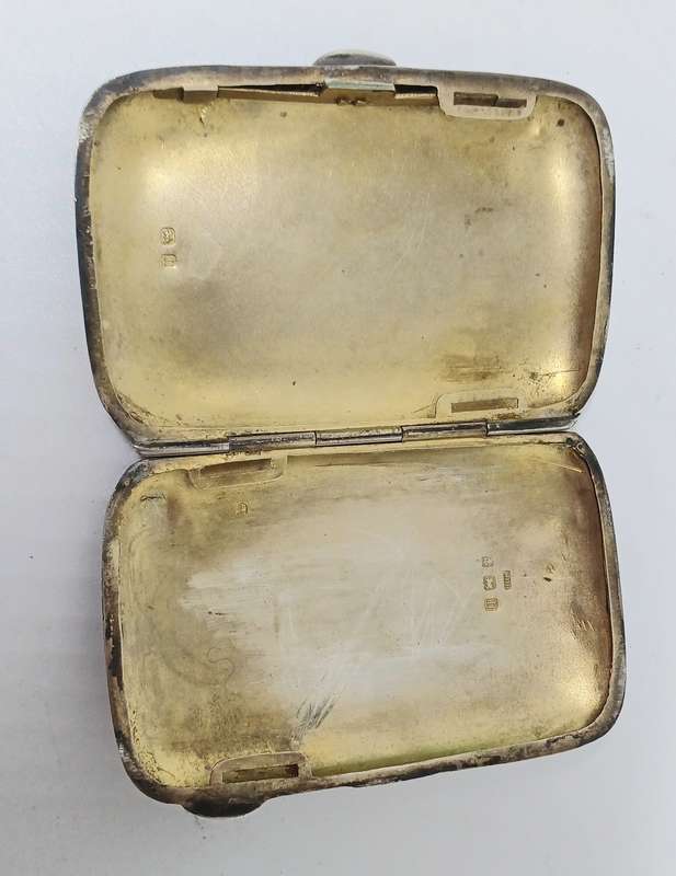 Silver case marked 36g
