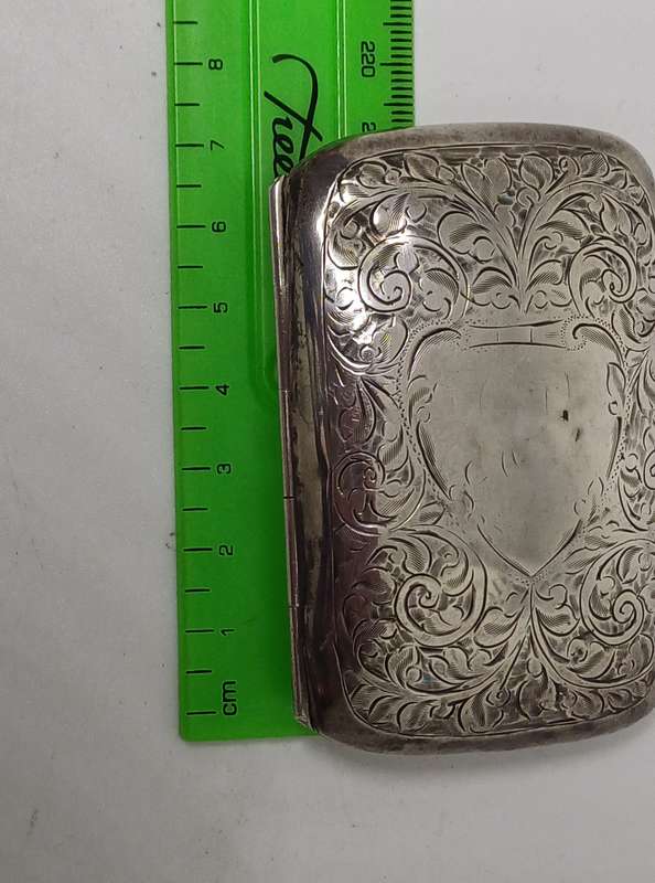 Silver case marked 36g