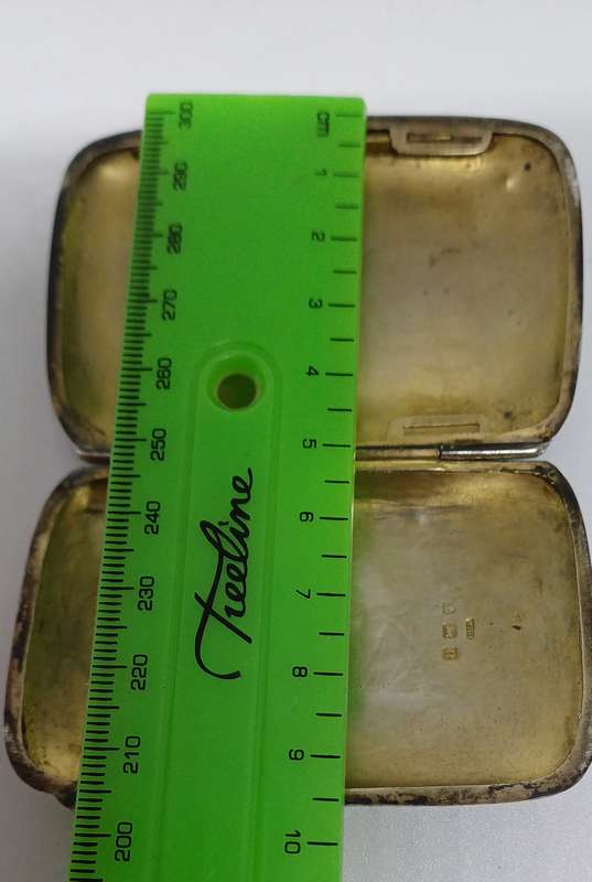 Silver case marked 36g