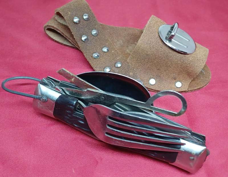 Multi-tool pocket knife in holder