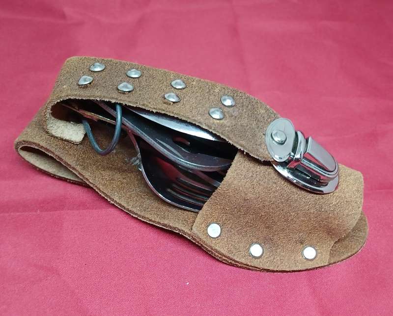 Multi-tool pocket knife in holder