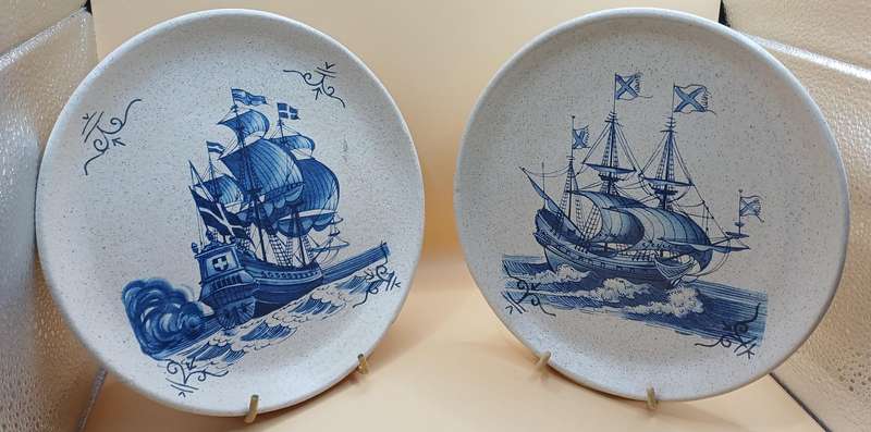 Two plates with sailing ships