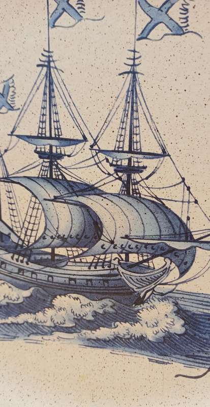 Two plates with sailing ships
