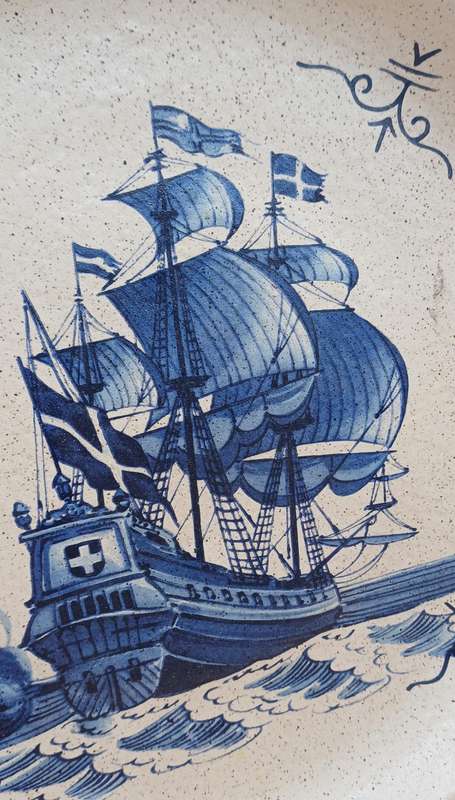 Two plates with sailing ships