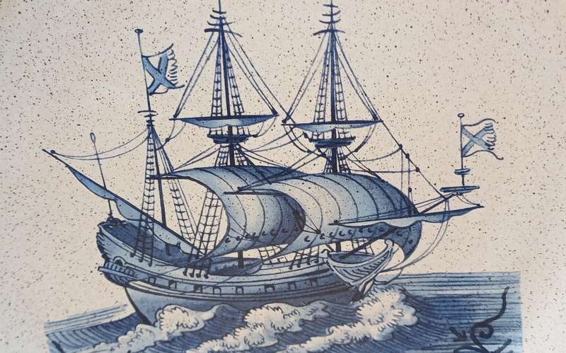 Two plates with sailing ships