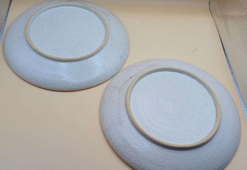 Two plates with sailing ships