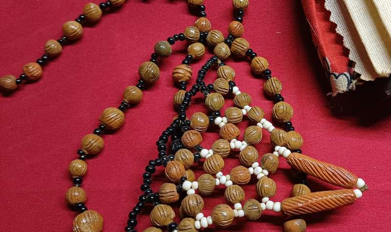 Vintage celluloid beaded dolls