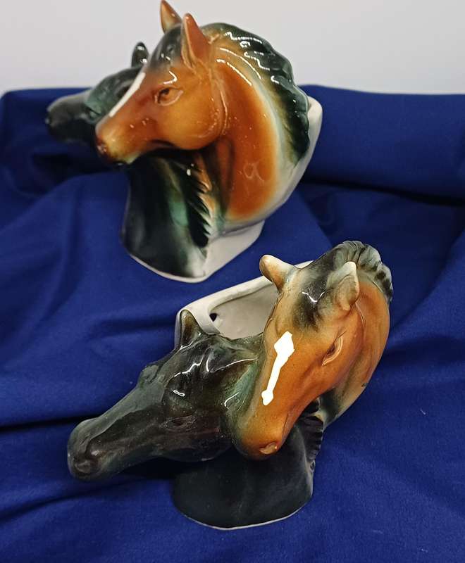 Two horse vase wall hangings